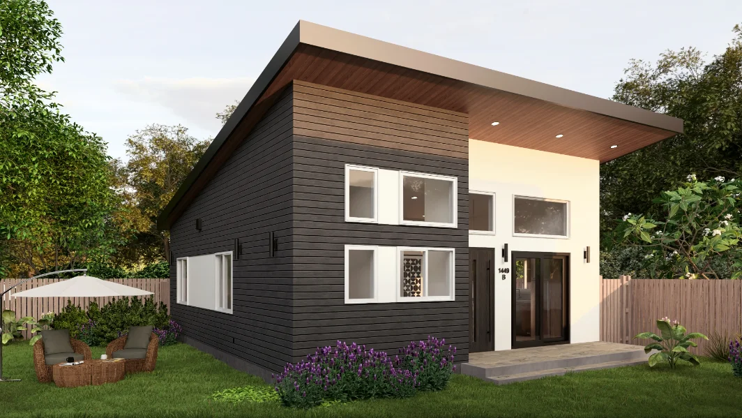 Detached accessory dwelling unit with dark siding and a covered entry on a rural Michigan lot