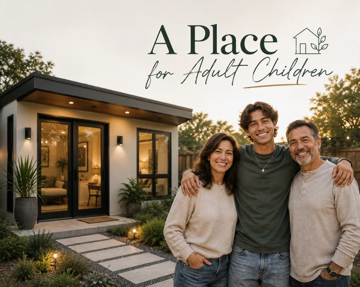 Family standing beside a small backyard home with its own private entrance