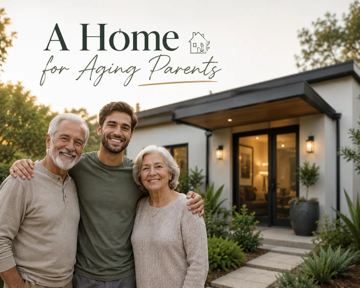 Three generations of a family outside a single-level backyard cottage
